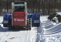 Telescoop skid loader snow pusher